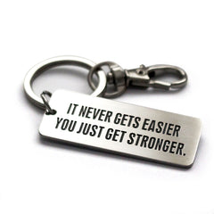 It Never Gets Easier You Just Get Stronger - Key Ring - CutAndJacked Shop