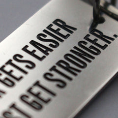 It Never Gets Easier You Just Get Stronger - Key Ring - CutAndJacked Shop