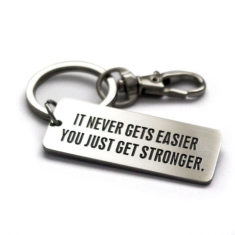 It Never Gets Easier You Just Get Stronger - Key Ring